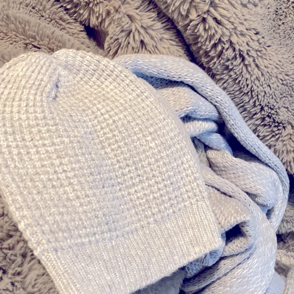2 gray beanies and 1 gray scarf